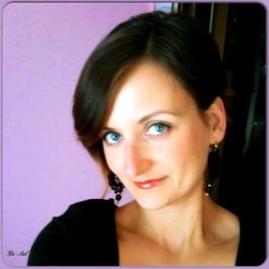 Hungarian-Italian beauty wearing Medium black Venetian lace earrings with black swarovski crystal and gold hardware 