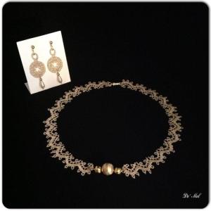 Royal gold Venetian lace necklace and matching earrings with gold hardware and drop shape synthetic pearls