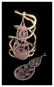 Large tear drop Venetian lace earrings with silver hardware