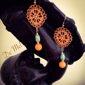 Spring summer details...De' Mel in tangerine lace with turquoise and orange beads.