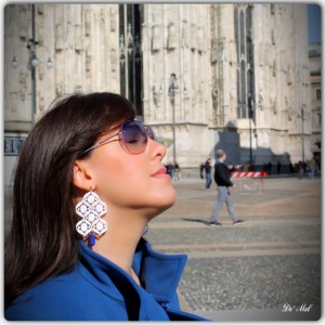 White for Spring-Summer 2013...large white Venetian lace earrings with drop shape opaque sapphire and gold hardware